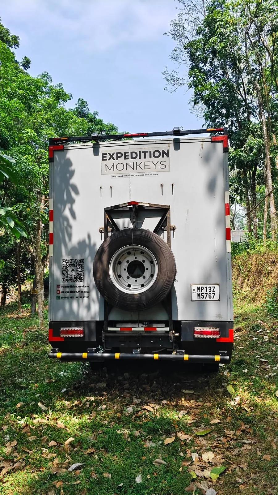 Rear of the truck with the spare wheel mounted on the door.